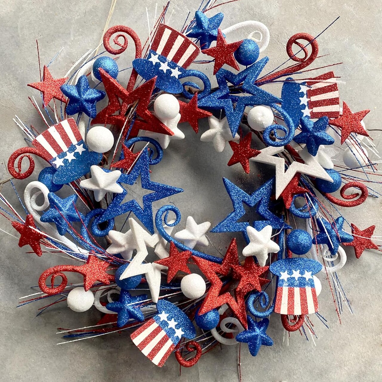 20-inch artificial floral twig wreath in red, white, and blue, designed with patriotic American flag-inspired colors, perfect for hanging on doors, walls, or tables to celebrate Independence Day, Flag Day, and other patriotic holidays.